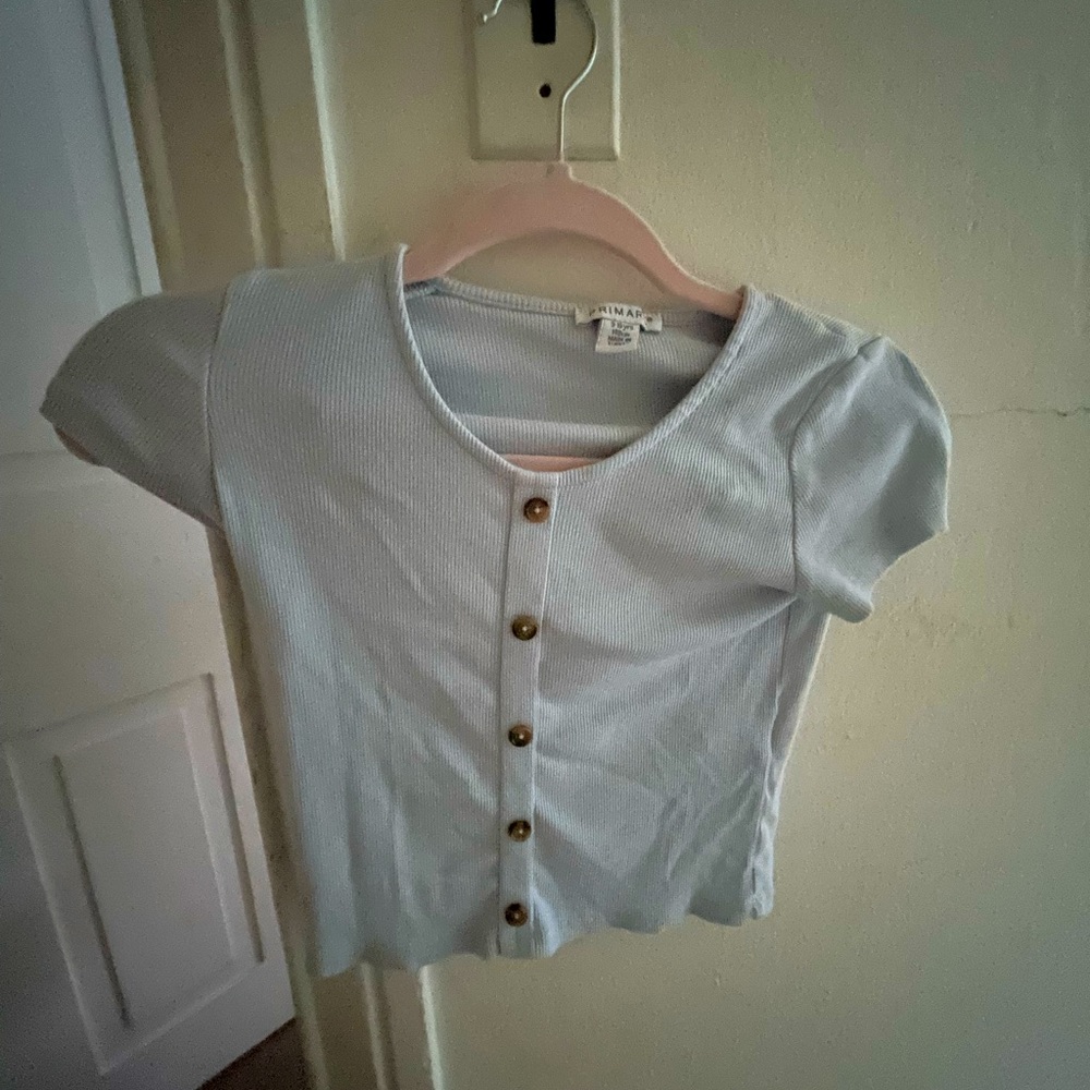 Cute baby blue shirt ! For 9-10 year olds (XS)